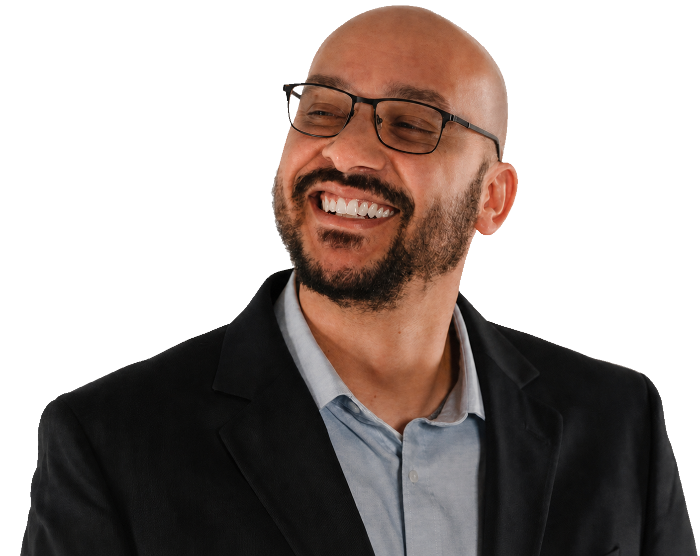Miles Greer, smiling in a black blazer